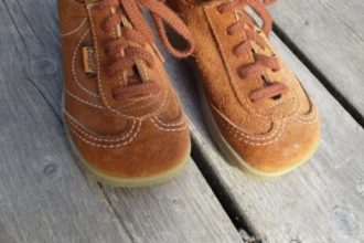 Vintage brown suede Cougar brand shoes.